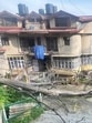 A building and electricity poles damaged as an uprooted tree fell down due to rain near Annandale, Shimla, on Wednesday. (HT Photo) A building and electricity poles damaged as an uprooted tree fell down due to rain near Annandale, Shimla, on Wednesday. (HT Photo)