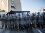 US Marines stand guard at the Edward R. Roybal Federal and Detention Center building during a protest against ICE US Marines stand guard at the Edward R. Roybal Federal and Detention Center building during a protest against ICE