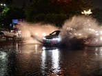 Vehicles wade through a waterlogged road amidst heavy rainfall, at Moti Bagh in New Delhi on July 9. Vehicles wade through a waterlogged road amidst heavy rainfall, at Moti Bagh in New Delhi on July 9.