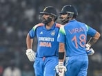 India's Virat Kohli (R) along with his captain Rohit Sharma