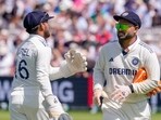 India's Dhruv Jurel, left, greets vice captain Rishabh Pant as the former arrives on the field after the latter's injury on the first day of the third test cricket match between India and England India's Dhruv Jurel, left, greets vice captain Rishabh Pant as the former arrives on the field after the latter's injury on the first day of the third test cricket match between India and England