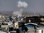 This picture taken from western Jabalia in the central Gaza Strip shows smoke plumes rising from Israeli bombardment in eastern Gaza City on July 9, 2025.
