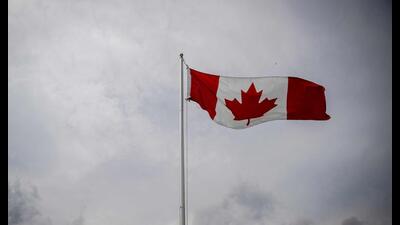 A Canadian flag flies during the Canada Day Celebrations in the Old Port in Montreal, Quebec. (AFP) A Canadian flag flies during the Canada Day Celebrations in the Old Port in Montreal, Quebec. (AFP)
