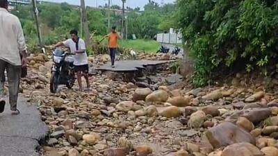 A portion of the Lakhanpur-Jagatpur link road that was washed away after heavy rain in the Jammu region on Thursday morning. (HT Photo) A portion of the Lakhanpur-Jagatpur link road that was washed away after heavy rain in the Jammu region on Thursday morning. (HT Photo)