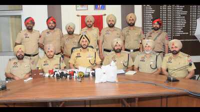 Amritsar commissioner of police Gurpreet Singh Bhullar addressing the media regarding the arrests. (HT photo) Amritsar commissioner of police Gurpreet Singh Bhullar addressing the media regarding the arrests. (HT photo)