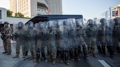 US Marines stand guard at the Edward R. Roybal Federal and Detention Center building during a protest against ICE (Getty Images via AFP) US Marines stand guard at the Edward R. Roybal Federal and Detention Center building during a protest against ICE (Getty Images via AFP)