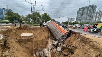 Due to heavy rain a truck loaded with beer got stuck as a large portion of the Southern Peripheral Road(SPR) caved-in near Sector-74A, in Gurugram, on Thursday. (Parveen Kumar/HT Photo) Due to heavy rain a truck loaded with beer got stuck as a large portion of the Southern Peripheral Road(SPR) caved-in near Sector-74A, in Gurugram, on Thursday. (Parveen Kumar/HT Photo)