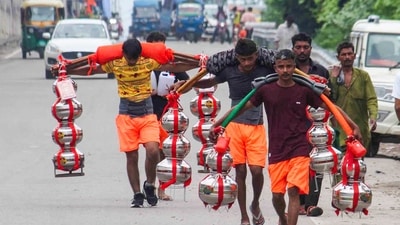 To ease traffic movement during the Kanwar Yatra, key routes and major intersections have been fitted with adequate lighting, digital signboards, and direction indicators. (PTI) To ease traffic movement during the Kanwar Yatra, key routes and major intersections have been fitted with adequate lighting, digital signboards, and direction indicators. (PTI)