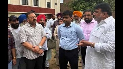 Ludhiana Central MLA Ashok Parashar Pappi and deputy commissioner Himanshu Jain inspecting the construction of the School of Eminence building in Kidwai Nagar on Thursday. (HT Photo)