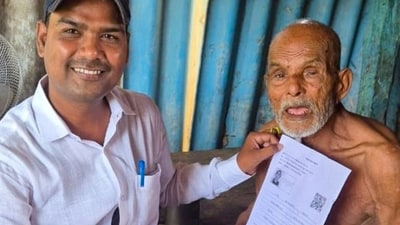 In this image posted by the Election Commission, an officer hands over an enumeration form to an elderly voter as part of the Special Intensive Revision of electoral rolls ahead of the Bihar assembly elections. (X/@ECISVEEP) In this image posted by the Election Commission, an officer hands over an enumeration form to an elderly voter as part of the Special Intensive Revision of electoral rolls ahead of the Bihar assembly elections. (X/@ECISVEEP)