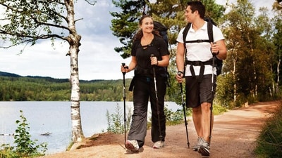 Like hiking, Nordic walking involves walking with poles on either side (Photo: Adobe Stock) Like hiking, Nordic walking involves walking with poles on either side (Photo: Adobe Stock)