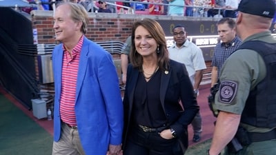 Texas Attorney General Ken Paxton, left, walks with his wife and Texas State Sen. Angela Paxton (AP) Texas Attorney General Ken Paxton, left, walks with his wife and Texas State Sen. Angela Paxton (AP)