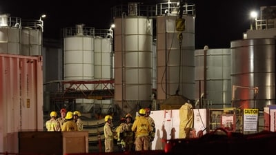 Los Angeles Fire Department (LAFD) firefighters are seen at the site of an industrial tunnel collapse in the Wilmington neighborhood of Los Angeles on July 9, 2025. 31 workers were safely removed from the tunnel without visible injuries, the LAFD said on July 9. (Photo by Patrick T. Fallon / AFP) (AFP) Los Angeles Fire Department (LAFD) firefighters are seen at the site of an industrial tunnel collapse in the Wilmington neighborhood of Los Angeles on July 9, 2025. 31 workers were safely removed from the tunnel without visible injuries, the LAFD said on July 9. (Photo by Patrick T. Fallon / AFP) (AFP)
