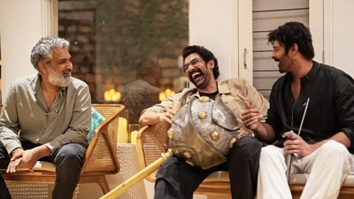 SS Rajamouli, Rana Daggubati and Prabhas share a light moment together. SS Rajamouli, Rana Daggubati and Prabhas share a light moment together.