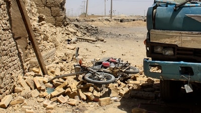 A general view shows damaged vehicles at the site a day after a bomb blast in Qila Abdullah, in Balochistan province, on May 19, 2025. (AFP/File) A general view shows damaged vehicles at the site a day after a bomb blast in Qila Abdullah, in Balochistan province, on May 19, 2025. (AFP/File)