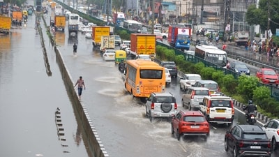Gurugram, India-July 10, 2025: Vehicles wade through a waterlogged stretch after heavy rain on the National Highway-48 service road near Narsinghpur village, in Gurugram, India, on Thursday, 10 July 2025. (Photo by Parveen Kumar/Hindustan Times) Gurugram, India-July 10, 2025: Vehicles wade through a waterlogged stretch after heavy rain on the National Highway-48 service road near Narsinghpur village, in Gurugram, India, on Thursday, 10 July 2025. (Photo by Parveen Kumar/Hindustan Times)