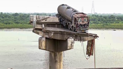 The site after several vehicles fell into the Mahisagar river when a portion of a four-decade-old bridge collapsed, in Gujarat's Vadodara district (PTI) The site after several vehicles fell into the Mahisagar river when a portion of a four-decade-old bridge collapsed, in Gujarat's Vadodara district (PTI)
