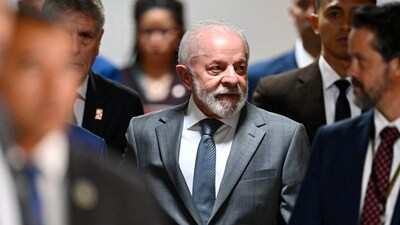 Brazil’s President Luiz Inacio Lula da Silva arriving to speak to the press in Brasilia on Wednesday Brazil’s President Luiz Inacio Lula da Silva arriving to speak to the press in Brasilia on Wednesday