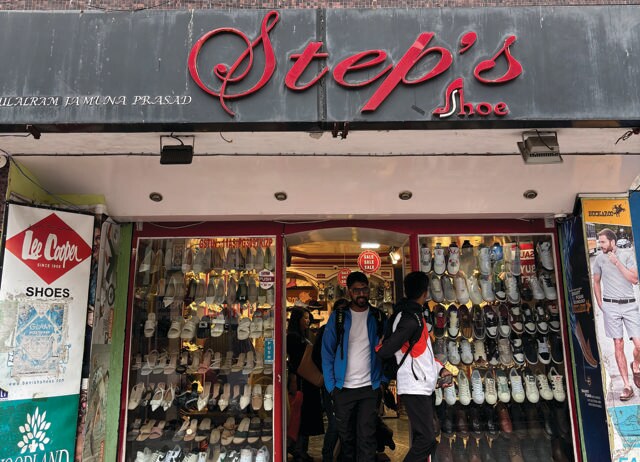 This shoe shop snuck a stiletto into its signage. This shoe shop snuck a stiletto into its signage.