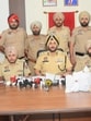 Amritsar commissioner of police Gurpreet Singh Bhullar addressing the media regarding the arrests. (HT photo) Amritsar commissioner of police Gurpreet Singh Bhullar addressing the media regarding the arrests. (HT photo)