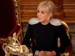 French President's wife Brigitte Macron looks on during a State Banquet