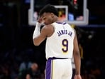 Bronny James #9 of the Los Angeles Lakers walks on the court against the Minnesota Timberwolves Bronny James #9 of the Los Angeles Lakers walks on the court against the Minnesota Timberwolves