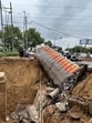 Due to heavy rain a truck loaded with beer got stuck as a large portion of the Southern Peripheral Road(SPR) caved-in near Sector-74A, in Gurugram, on Thursday. (Parveen Kumar/HT Photo) Due to heavy rain a truck loaded with beer got stuck as a large portion of the Southern Peripheral Road(SPR) caved-in near Sector-74A, in Gurugram, on Thursday. (Parveen Kumar/HT Photo)