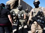 Federal agents block people protesting an ICE immigration raid at a nearby licensed cannabis farm near Camarillo Federal agents block people protesting an ICE immigration raid at a nearby licensed cannabis farm near Camarillo