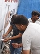 Officials of the Karnal municipal corporation sealing a property on Thursday. (HT Photo)