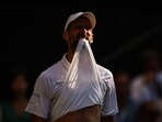 Serbia's Novak Djokovic bites his jersey as he plays against Italy's Jannik Sinner during their men's singles semi-final tennis match on the twelfth day of the 2025 Wimbledon Championships at The All England Lawn Tennis and Croquet Club in Wimbledon, southwest London, on July 11, 2025. (Photo by HENRY NICHOLLS / AFP) / RESTRICTED TO EDITORIAL USE Serbia's Novak Djokovic bites his jersey as he plays against Italy's Jannik Sinner during their men's singles semi-final tennis match on the twelfth day of the 2025 Wimbledon Championships at The All England Lawn Tennis and Croquet Club in Wimbledon, southwest London, on July 11, 2025. (Photo by HENRY NICHOLLS / AFP) / RESTRICTED TO EDITORIAL USE