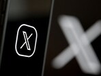 This illustration photograph shows the logo of social network X (formerly Twitter) displayed on a smartphone.
