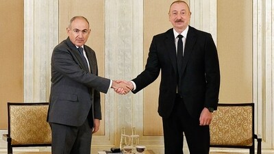 This handout photograph taken and released by Armenia's governmental press service on July 10, 2025, shows Armenia's Prime Minister Nikol Pashinyan (L) meeting with Azerbaijan's President Alham Aliyev (R) in Abu Dhabi. (AFP) This handout photograph taken and released by Armenia's governmental press service on July 10, 2025, shows Armenia's Prime Minister Nikol Pashinyan (L) meeting with Azerbaijan's President Alham Aliyev (R) in Abu Dhabi. (AFP)