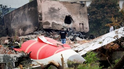 A firefighter stands next to the crashed Air India Boeing 787-8 Dreamliner aircraft in Ahmedabad, India, June 13, 2025. (Reuters)