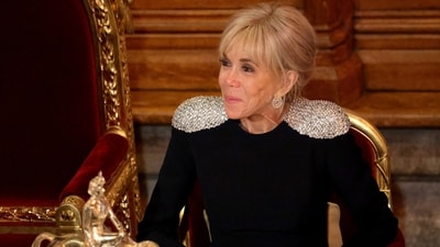 French President's wife Brigitte Macron looks on during a State Banquet (via REUTERS)