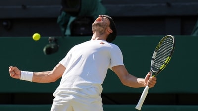 Spain's Carlos Alcaraz celebrates after beating Taylor Fritz of the U.S. in a men's singles semifinal at Wimbledon (AP) Spain's Carlos Alcaraz celebrates after beating Taylor Fritz of the U.S. in a men's singles semifinal at Wimbledon (AP)