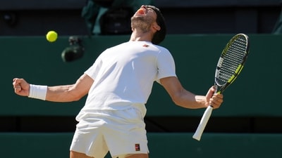 Spain's Carlos Alcaraz celebrates after beating Taylor Fritz of the US in a men's singles semifinal at the Wimbledon Tennis Championships in London, (AP) Spain's Carlos Alcaraz celebrates after beating Taylor Fritz of the US in a men's singles semifinal at the Wimbledon Tennis Championships in London, (AP)