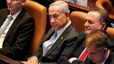 Israel's (L to R) Prime Minister Benjamin Netanyahu, Defence Minister Israel Katz, and Energy and Infrastructure Minister Eli Cohen. (AFP)