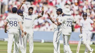 India's Jasprit Bumrah, left, celebrates with teammates after the dismissal of England's Jofra Archer. (AP)
