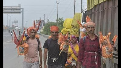 Kanwarias in Ghaziabad, carrying Ganga water from Haridwar, going towards Rajasthan, on Friday. (Sakib Ali/HT Photo) Kanwarias in Ghaziabad, carrying Ganga water from Haridwar, going towards Rajasthan, on Friday. (Sakib Ali/HT Photo)