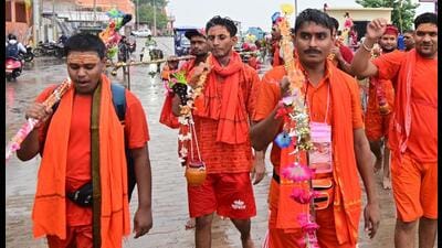 Kanwariyas collecting the holy Ganga water at Dashashwamedh Ghat in Prayagraj on the first Sawan day on July 11. (HT photo) Kanwariyas collecting the holy Ganga water at Dashashwamedh Ghat in Prayagraj on the first Sawan day on July 11. (HT photo)