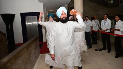 Leader of opposition and Congress MLA Partap Singh Bajwa walking out of the Punjab Vidhan Sabha on Friday. (Ravi Kumar/HT) Leader of opposition and Congress MLA Partap Singh Bajwa walking out of the Punjab Vidhan Sabha on Friday. (Ravi Kumar/HT)