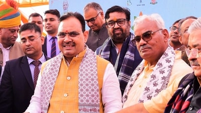 Rajasthan education minister Madan Dilawar with CM Bhajanlal Sharma. (PTI) Rajasthan education minister Madan Dilawar with CM Bhajanlal Sharma. (PTI)