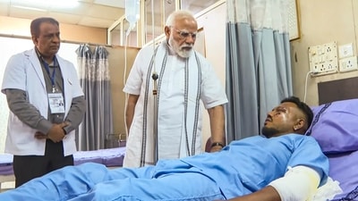 In this video grab via PMO, Prime Minister Narendra Modi meets Vishwash Kumar Ramesh, the lone survivor of Air India 171 plane crash. (PMO) In this video grab via PMO, Prime Minister Narendra Modi meets Vishwash Kumar Ramesh, the lone survivor of Air India 171 plane crash. (PMO)
