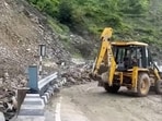 Efforts on to clear the Chandigarh-Manali highway (NH21) that was blocked after a landslide was triggered by rain at Kainchi Mod near Pandoh in Mandi district on Saturday. (HT Photo) Efforts on to clear the Chandigarh-Manali highway (NH21) that was blocked after a landslide was triggered by rain at Kainchi Mod near Pandoh in Mandi district on Saturday. (HT Photo)