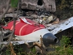 (FILES) Wreckage showing the tail section of the Air India Boeing 787-8 is pictured in a residential area near the airport in Ahmedabad on June 14, 2025, after the aircraft operating as flight 171 crashed shortly after taking off on June 12.