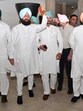 Leader of Opposition Partap Singh Bajwa along with other Congress MLAs walk out of the Punjab vidhan sabha on Friday. (Ravi Kumar/HT)
