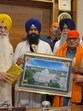 Punjab governor Gulab Chand Kataria being honoured by Akal Takht acting jathedar Giani Kuldeep Singh Gargaj at Anandpur Sahib on Friday. Punjab governor Gulab Chand Kataria being honoured by Akal Takht acting jathedar Giani Kuldeep Singh Gargaj at Anandpur Sahib on Friday.