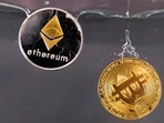 Souvenir tokens representing cryptocurrency Bitcoin and the Ethereum network, with its native token ether.