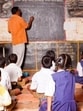 Ratnagiri, INDIA - February 20, 2010: One male teacher teaching in a rural school of India. The school is located in a village called Peve Khare Kound in Ratnagiri District of Maharashtra State. (Getty Images)