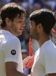Spain's Carlos Alcaraz, right, greets Taylor Fritz of the US after beating him in their Wimbledon semi-final. (AP)